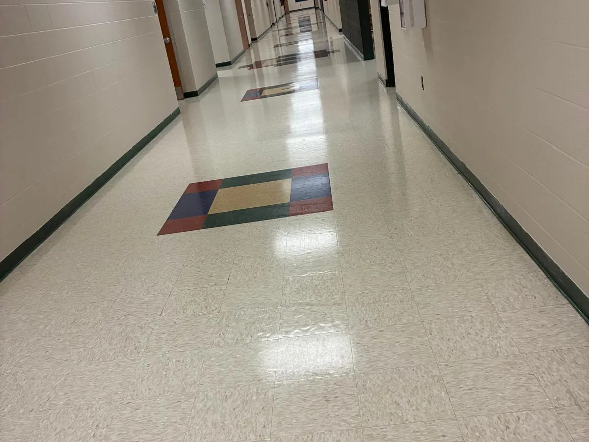 Long school hallway with freshly waxed floor