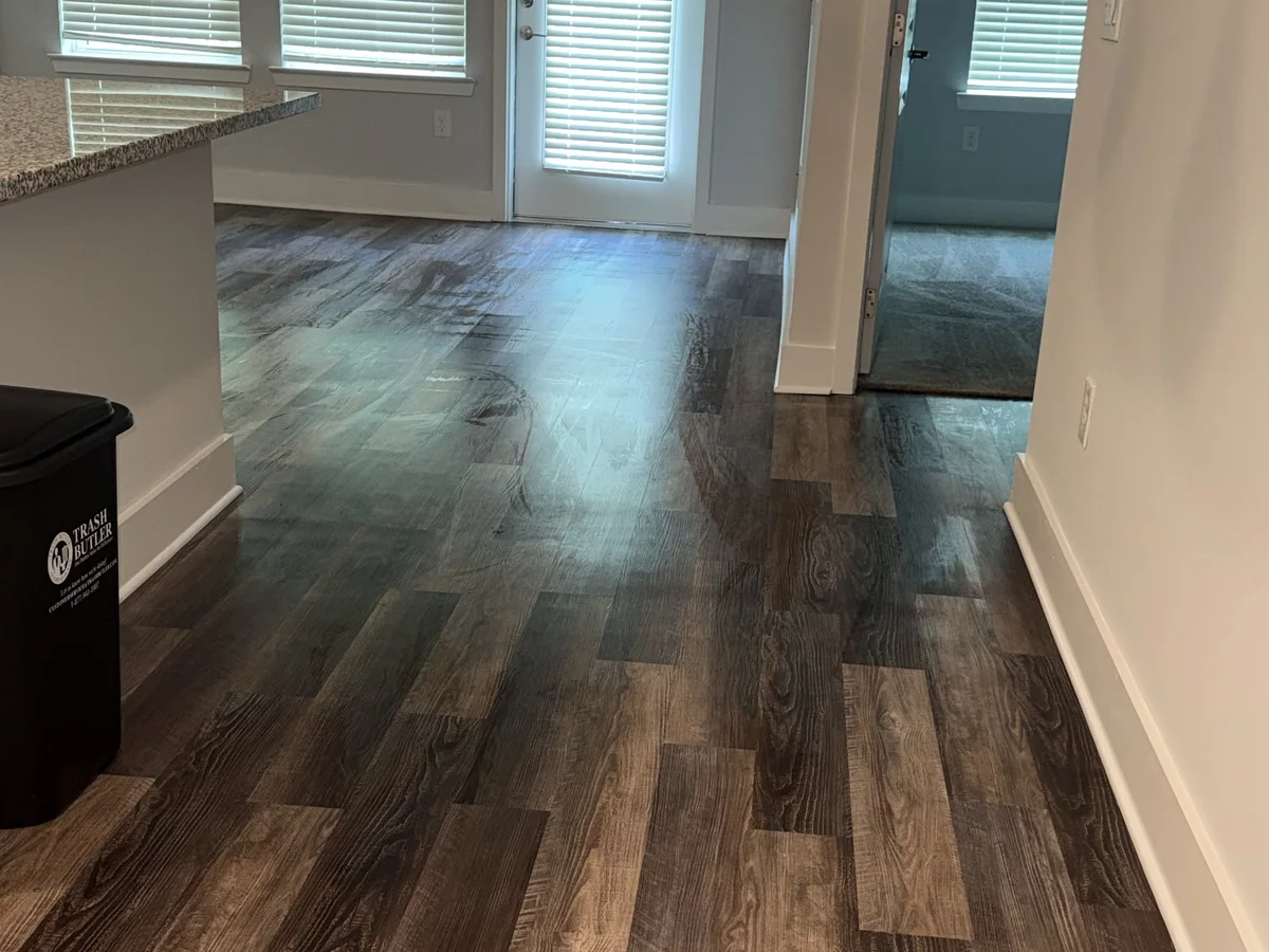 Freshly painted room with new floors and windows